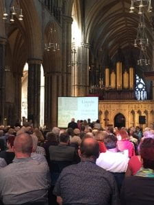 An image of Dr Asbridge delivering his talk in the cathedral