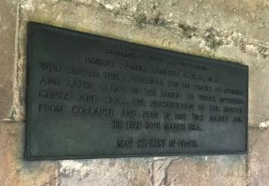 A photograph of Memorial to R. S. Godfrey, Clerk of Works in Cathedral Cloister, south wall.