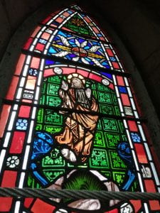 A picture of a stained glass window in the north transept of Lincoln cathedral.